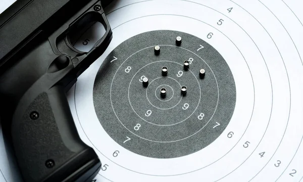 Black Air Gun Pellet Gun Laying Paper Shooting Target Next — Stock Photo, Image