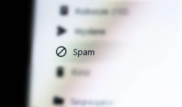 Spam messages folder in a generic email client web app, unwanted mail ads spam e-mail AI filtering, message filters, phishing mitigation abstract concept, nobody. Desktop PC, computer monitor, screen