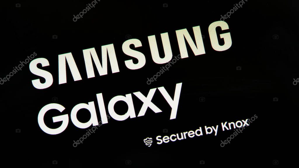 Samsung Galaxy S flagship smartphone mobile device series boot logo AMOLED display detail closeup secured by Knox technology, famous mobile phone brand symbol up close