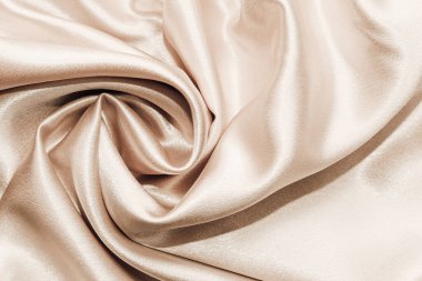 Beige silk fabric texture, Satin fashion Background for content.