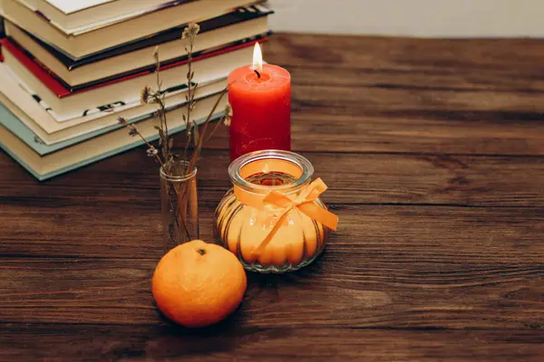 Still Life Skins Orange Aroma Candle Figured Candlestick Bow Books — Stock Photo, Image