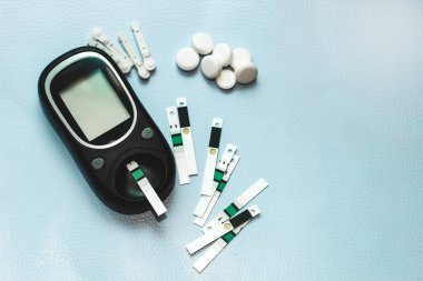 A gadget for measuring blood sugar for diabetics. clipart