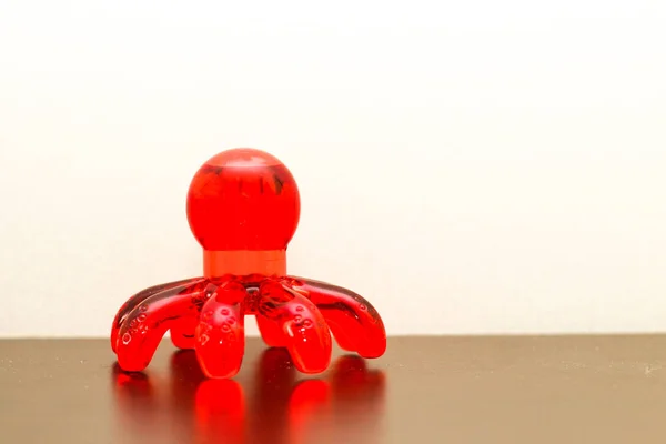 Masajeador Plástico Mano Rojo Forma Pulpo — Foto de Stock