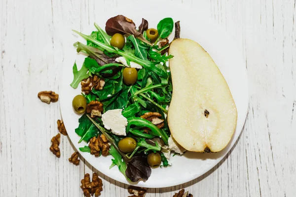 Salad Pears Herbs Arugula Prosciutto Cheese Green Olives Nuts — Stock Photo, Image