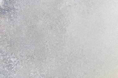 Açık gri beton yüzeyin yakın plan görüntüsü ince doku değişiklikleri ve yumuşak üniforma görünümlü..