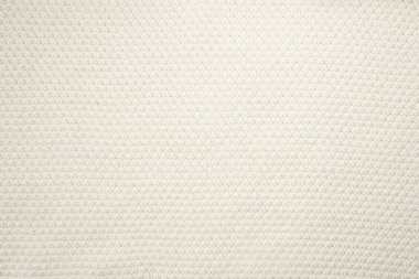 Açık krem renginde yumuşak dokuma kumaş, el sanatları ve iç tasarım için idealdir. Çeşitli projeler için rahatlatıcı bir zemin sağlar..