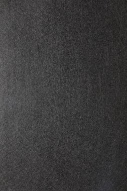 Koyu dokulu bir yüzeye yakından bakıldığında karmaşık desenler ve ayrıntılar sanatsal yorumlamaya davet edilir..