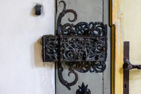 Ornate Cast Iron Lock Old Wooden Door Intricate Curlicue Pattern — Stock Photo, Image
