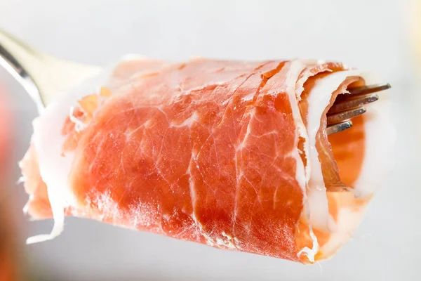 Macro View Prosciutto Ham Wrapped Fork — Stock Photo, Image