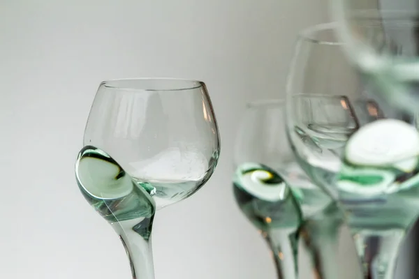 Extreme Close Artisan Wine Liqueur Green Glass Stem Glasses Arranged — Stock Photo, Image