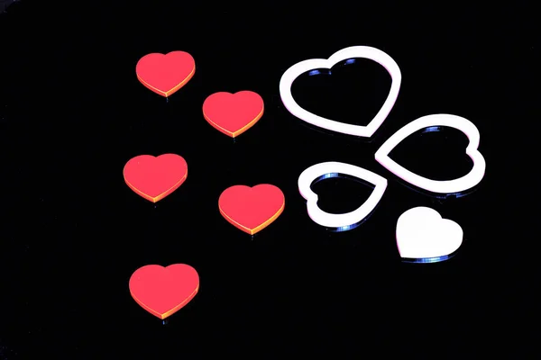 Plastic Coloured Hearts Black Background — Stock Photo, Image