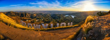 Hollywood, California, USA - November 13, 2023 : The iconic Hollywood sign overlooking Los Angeles from Mount Lee in the Santa Monica Mountains viewed at sunset. clipart