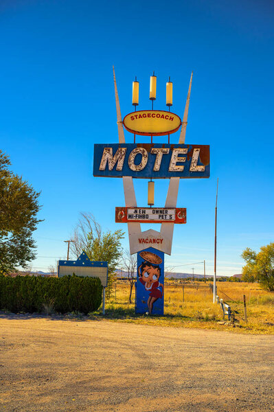 Seligman, Arizona, USA - November 4, 2023 : Retro sign for the Stagecoach 66 Motel along historic Route 66 in Seligman, Arizona.