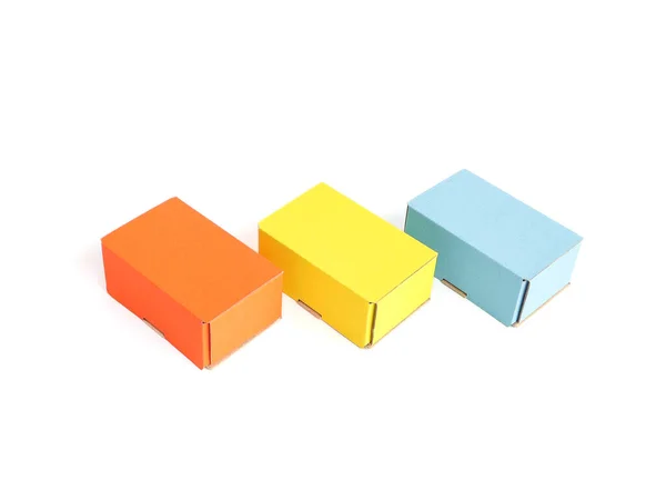 Colored Craft Boxes White Background Orange Blue Yellow Place Text — Stock Photo, Image