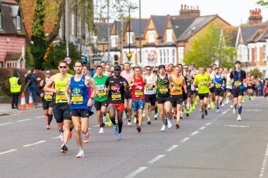 LONDON, UK - 21ST APRIL 2024: Runners in the London Marathon 2024 men's elite clipart