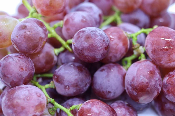 stock image Bunch of grapes on white background