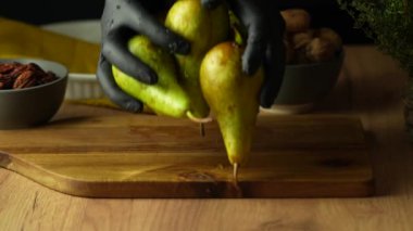 Washing pears laid out on a board