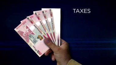 Namibia Dollar paper note holding. Fan of NAD banknotes in hand. Metaphor concept of income loss, cost of live, tax, credits and money decline.