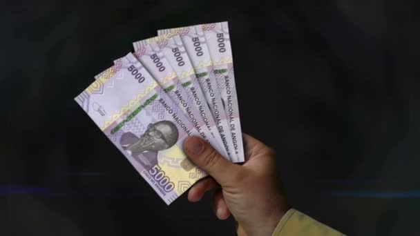 Angola Kwanza Money Holding Fan Banknotes Hand Aoa Paper Cash — стоковое видео