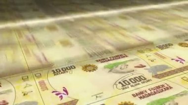 Madagaskar Ariaresi büyüyen para yığını. MGA banknotları dönüyor. Kusursuz ve döngülü finans kavramı, ekonomi krizi, enflasyon ve iş dünyası.
