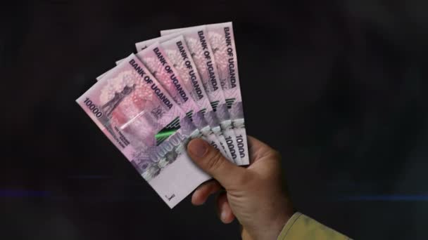 Uganda Shilling Money Holding Fan Banknotes Hand Ugx Paper Cash — Stock Video