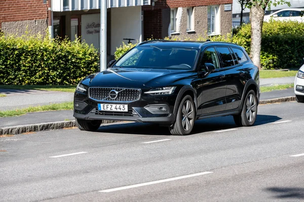 stock image Gothenburg, Sweden - July 27 2022: Black 2021 Volvo V60CC street parked.