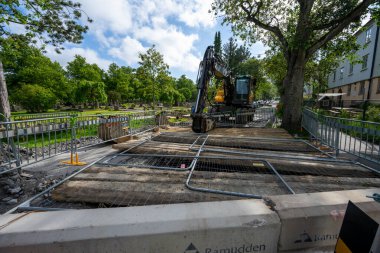 Gothenburg, Sweden - June 13 2022: Left turning road underneath bridges.