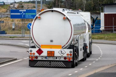Gothenburg, Sweden - July 24 2022: White tanker trailer marked UN 33 1203 Petrol.