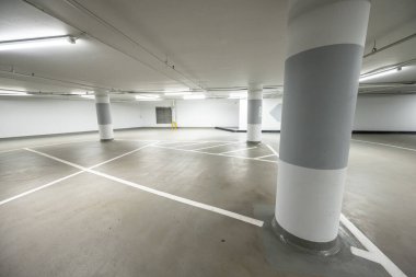 Inside an empty parking garage.