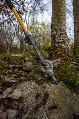 Gothenburg, Sweden - december 06 2022: Bolt and wire tensioner securing a power pole.
