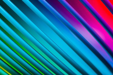 Teal and blue pattern on colourful background..