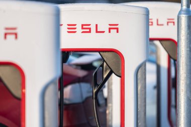 Gothenburg, Sweden - december 10 2022: Tesla Superchargers in winter sun.