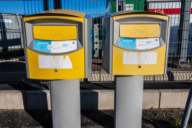 Gothenburg, Sweden - november 16 2022: Swedish mailboxes on a street corner.