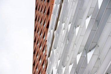 Malmo, Sweden - July 09 2022: Two different window patterns on office buildings.