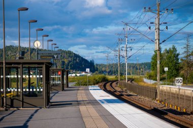 Kungsbacka, Sweden - september 11 2022: Railway station on a curve in the tracks.