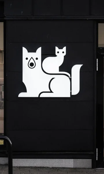Logo of a dog and a cat.