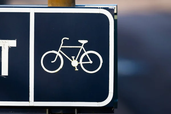 Bicycle sign marking the way to bike road.