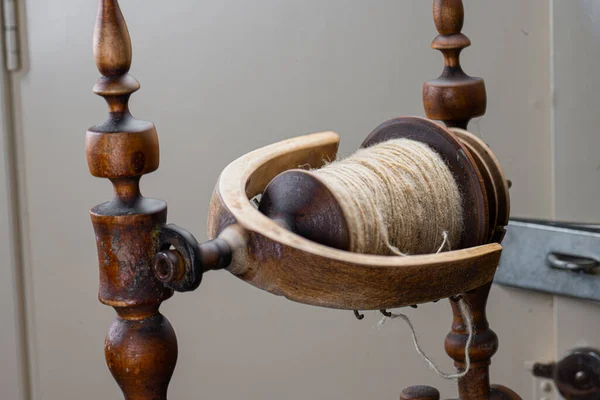 stock image Details of an old wooden spinning rock.