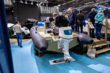 Gothenburg, Sweden - december 03 2022: Stream propulsion electric outboard motor mounted on a rigid inflatable boat.
