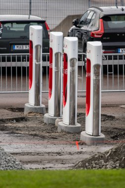 Gothenburg, Sweden - november 09 2022: Tesla Superchatgers being installed at a parking lot.