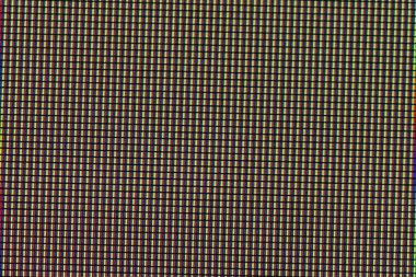 Macro details of a LCD TV screen with red green and blue microscopic lights.