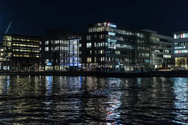 stock image Gothenburg, Sweden - december 17 2021: Night-time photo of modern offices at Lindholmen.