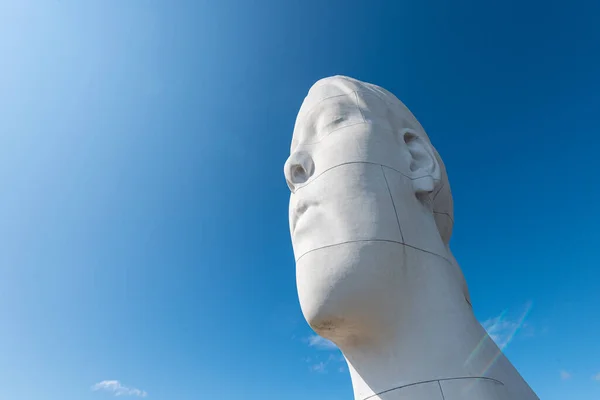 stock image Tjorn, Sweden - August 19 2021: Sculpture Anna by Jaume Plensa at Pilande sculpture park.