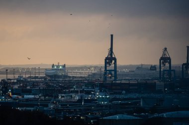 Gothenburg, Sweden - October 24 2022: Evening photo of shipping port of Gothenburg.