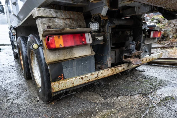 stock image Lindesnes, Norway - January 04 2023: Rear lights of an old and worn truck.