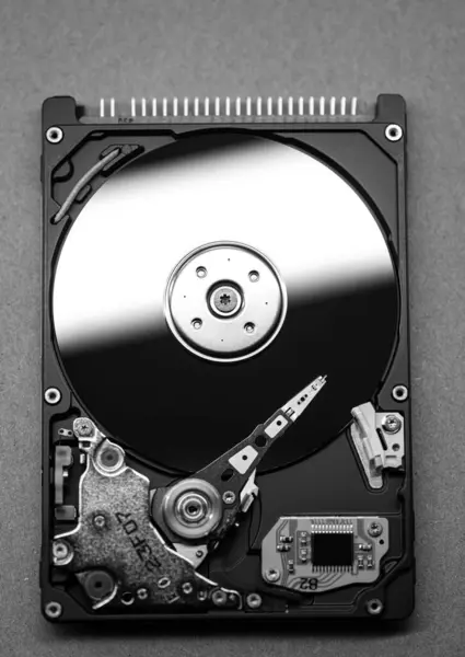 Mechanics inside a hard disk drive.