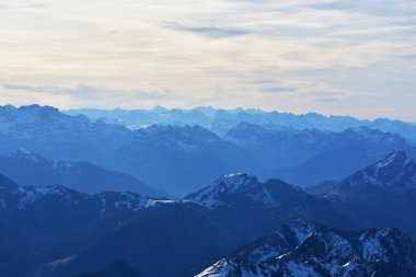 peak of the alpine mountains in the snow