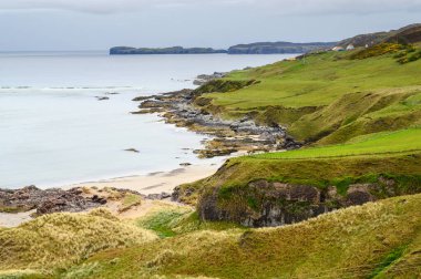 Northern shore of Scotland with cliffs and white beaches