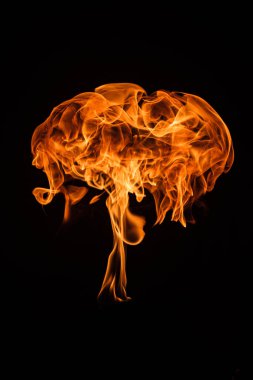 fireball on a male hand with black background