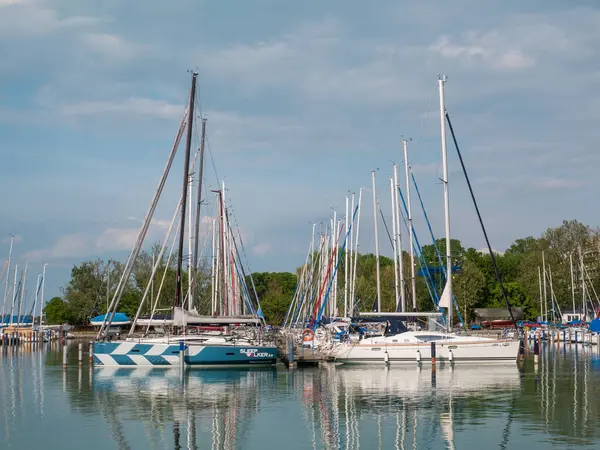 stock image BALATON LAKE/HUNGARY - 2023-05-07 Boats and sailboats in marine at lake Balaton